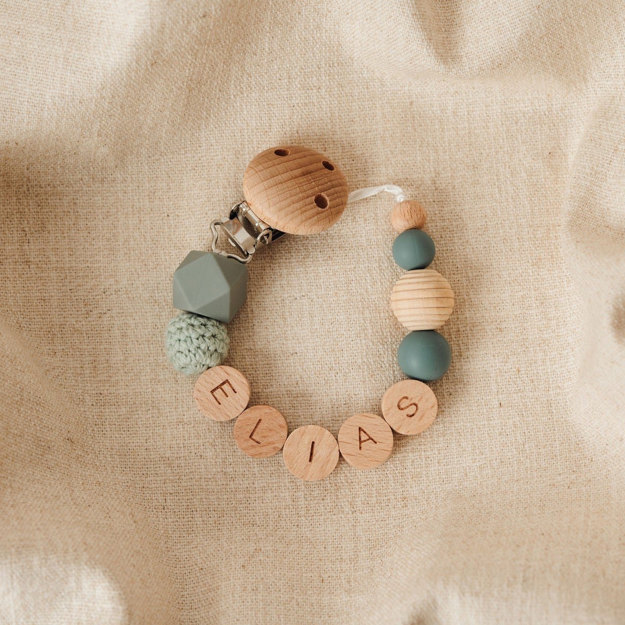 Schnullerkette personalisiert mit Namen rund – türkis