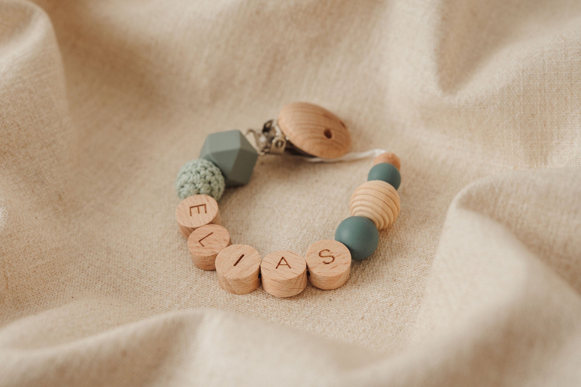 Schnullerkette personalisiert mit Namen rund – türkis